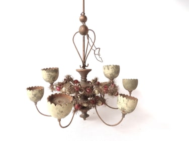 An unusual Christmas hanging fixture having 8 hand carved wooden flower shaped holders attached by