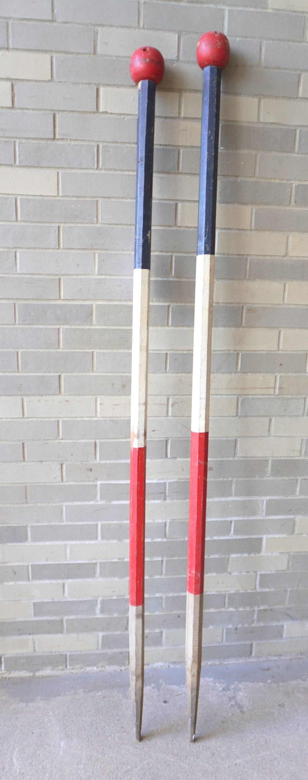Two hand made wooden patriotic parade or election markers with position for flags.: Two matching patriotic red, white and blue wooden hexagonal parade or election markers with ball finials for holding 5 American flags, probably late 19th century. All hand made in very good condition 