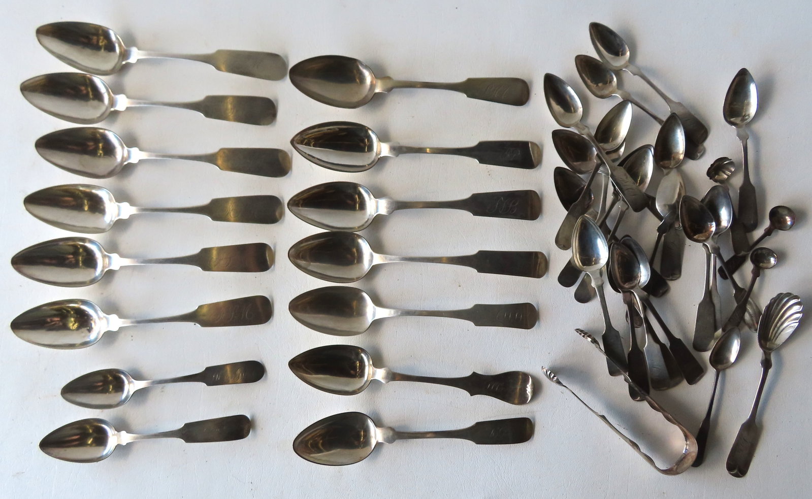 Large grouping of 41 pieces of coin silver, most Poughkeepsie area. 33.2 troy oz.: Large grouping of 41 pieces of coin silver, most Poughkeepsie area, including dinner/soup spoons (6 signed C. Beckwith), tea spoons (various local makers - Hayes, Adriance, Storm, etc.), sugar tongs (