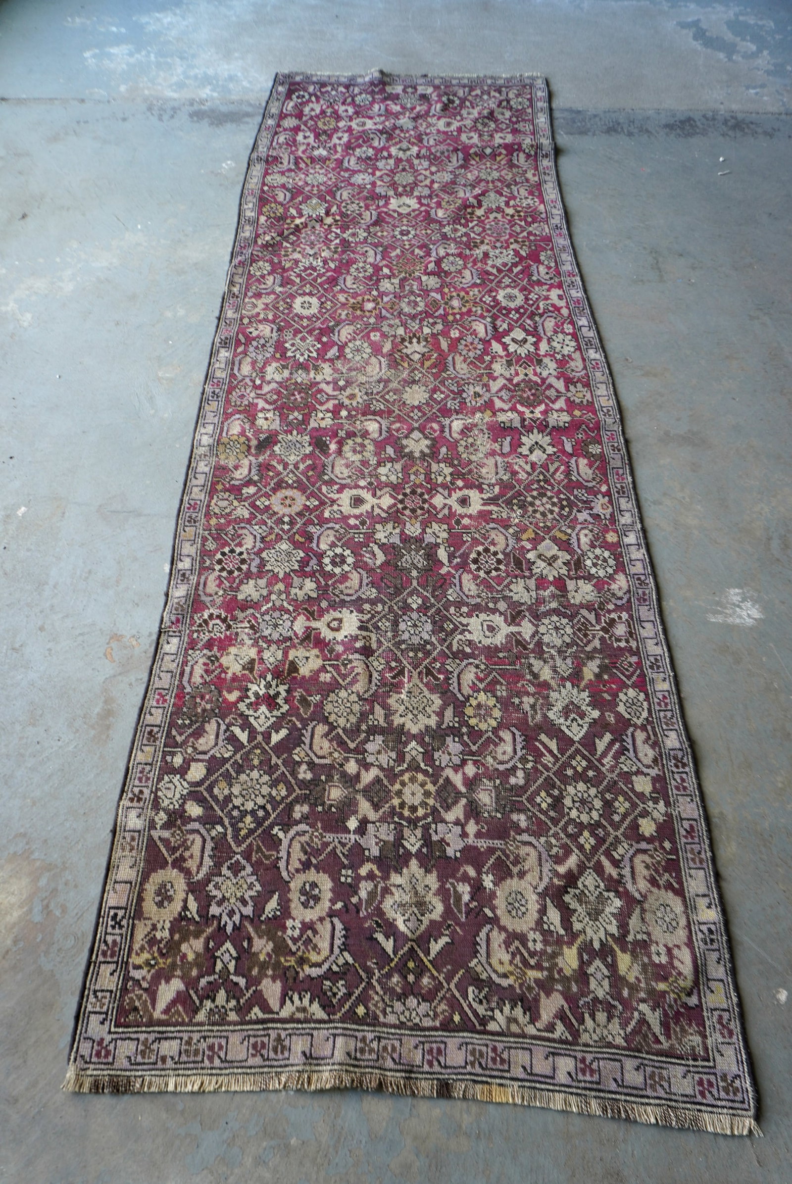 Oriental runner, hand woven, late 19th to early 20th century: Oriental runner, hand woven, late 19th to early 20th century - some wear, two professional repairs (hardly noticeable - see photos) otherwise good condition. Measures 10" 10"L x 3' 3 1/2"W.