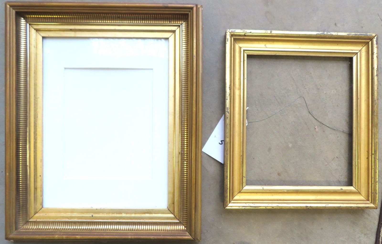 Two good lemon gold frames, circa 1830-60, both in very good condition.: Two good lemon gold frames, circa 1830-60. Both in very good condition. The smallest measures 14" x 16" with an opening 10 1/2" x 12 7/8" - missing glass; and the larger with glass and mat, overall si
