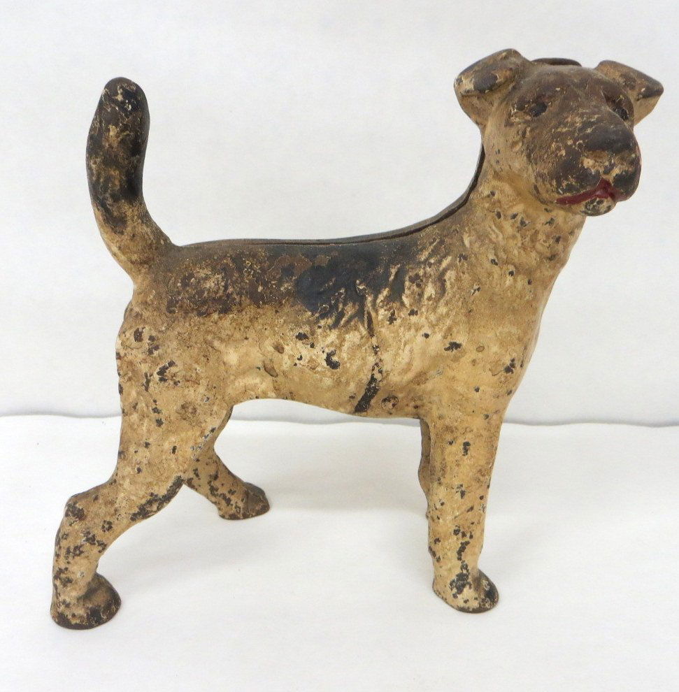 Cast iron dog door stop Airedale in original paint.