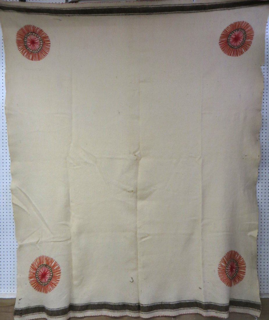 Homespun wool blanket with hand sewn sun pattern in eac: Homespun wool blanket with hand sewn sun pattern in each corner - some moth damage - late 19th century. 6' 5" x 7' 9".