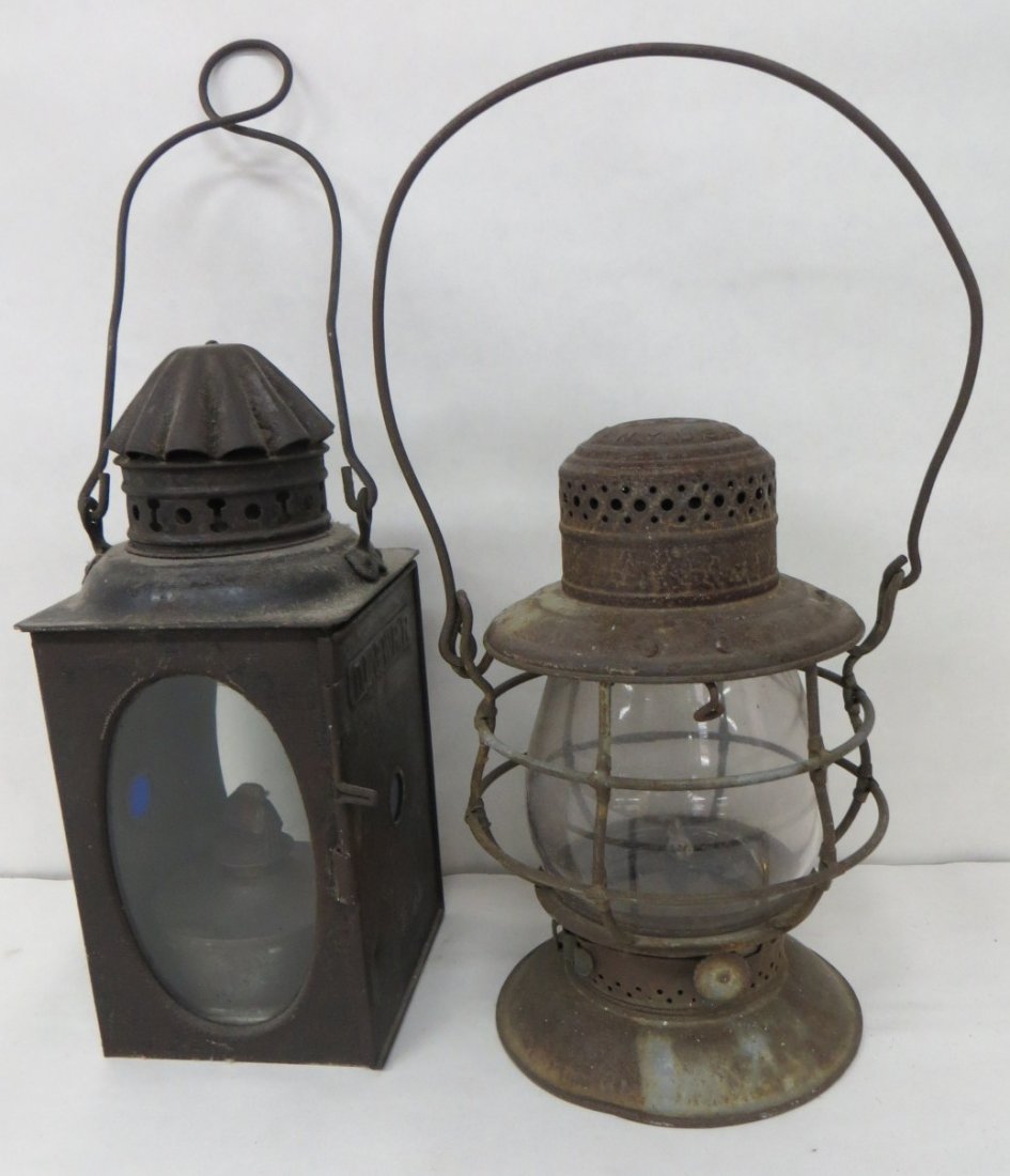 Two lighting devices: Early RR lantern with blue lights: Two lighting devices: Early RR lantern with blue lights signed D.L. & WRR ( Delaware, Lackawanna & Western Railroad) together with a Dietz NY railroad lantern.