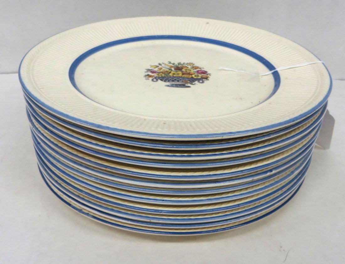 Set of 12 dinner plates decorated with a basket of flow: Set of 12 dinner plates decorated with a basket of flowers in the "Diana" pattern signed Rorstrand, made in Sweden.