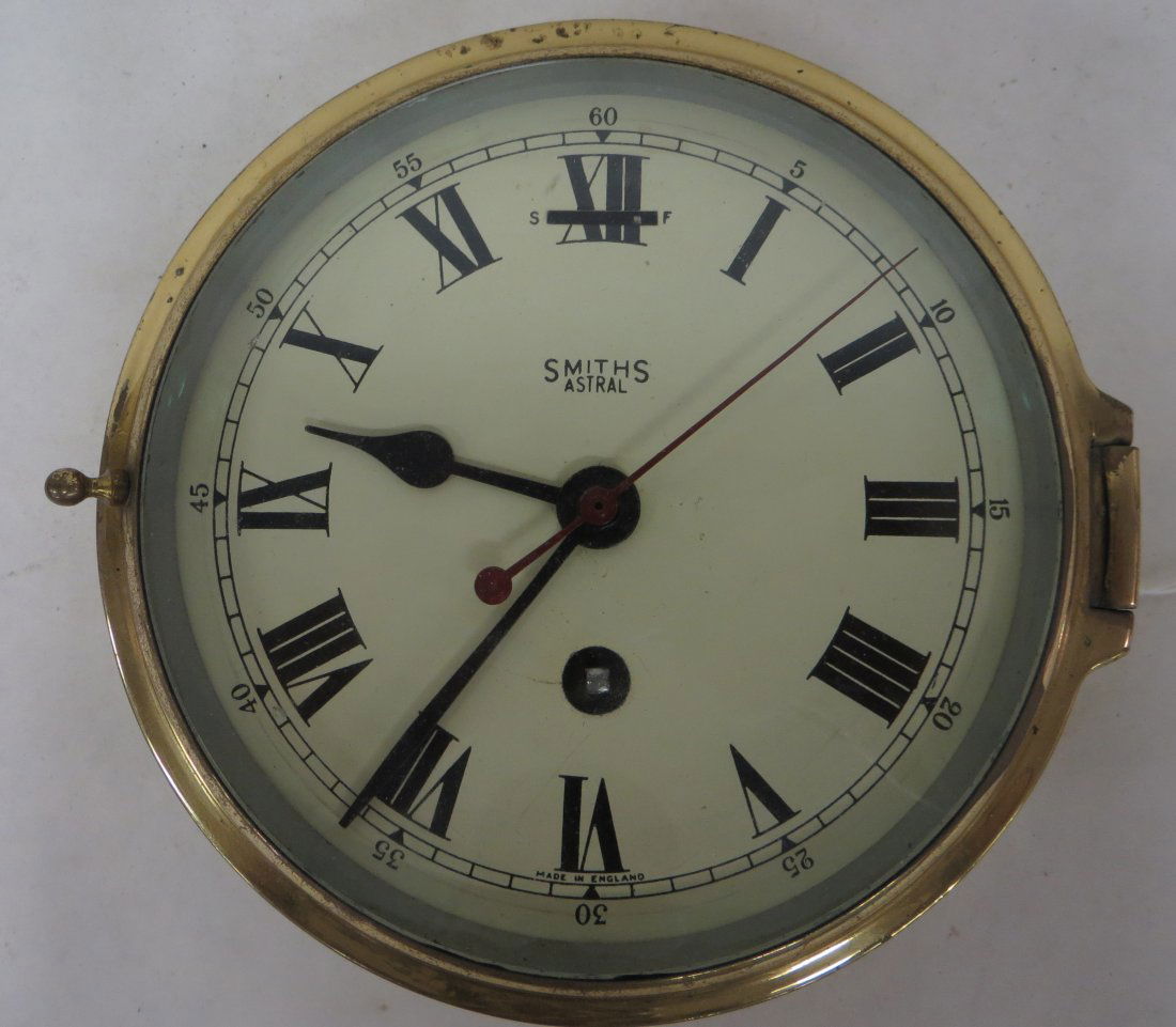 English brass ship's clock signed Smith's Astral. 7"D.: English brass ship's clock signed Smith's Astral. 7"D.