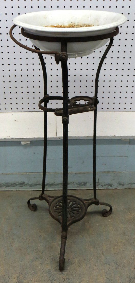 Victorian cast iron washstand with swivel towel bar. Pr: Victorian cast iron washstand with swivel towel bar. Provenance: From a large Beekman NY estate, name withheld by family.