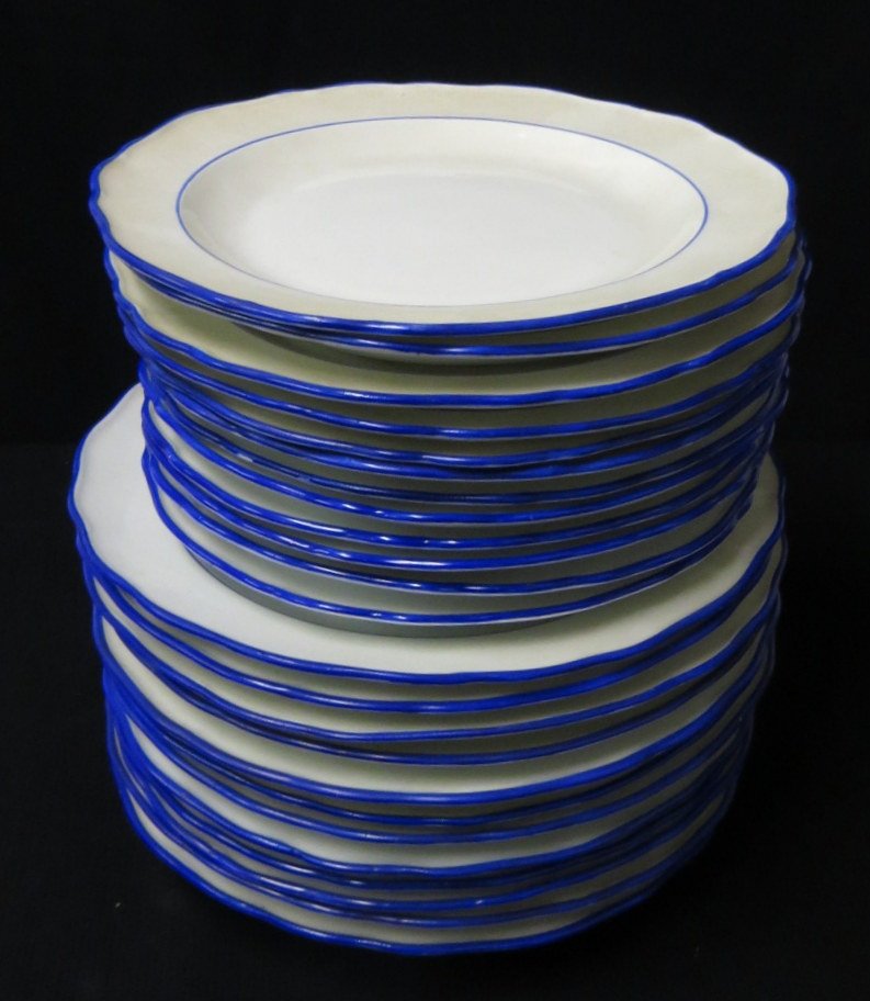 Set of 24 white plates with blue rims including twelve : Set of 24 white plates with blue rims including twelve 8.5" dessert plates and 12 dinner plates - all with a crossed sword blue mark on base, probably Meissen. Provenance: From a large Beekman NY esta