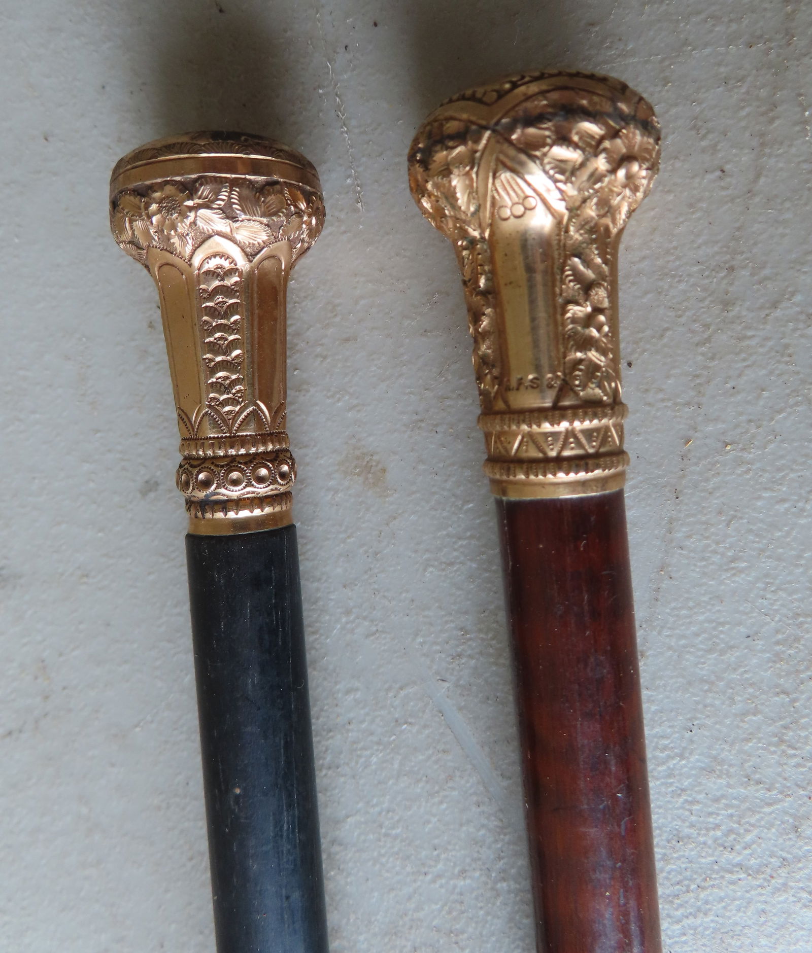 Two R.F.S. & Co. walking stick and umbrella with engraved gold handles. The walking stick measures (1 of 9)
