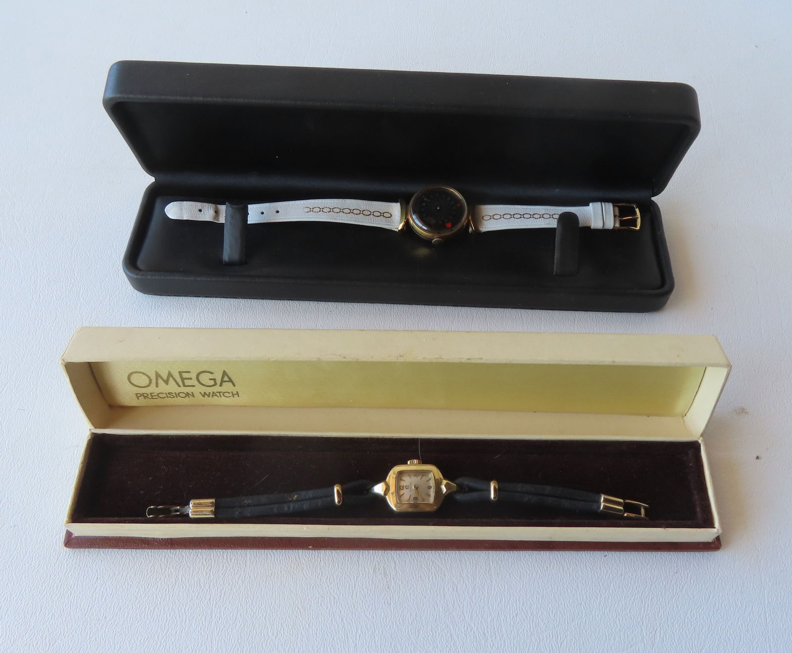 Two lady's wrist watches. The first, an Ernest Borel Swiss cocktail Kaleidoscope watch with 17 (1 of 9)