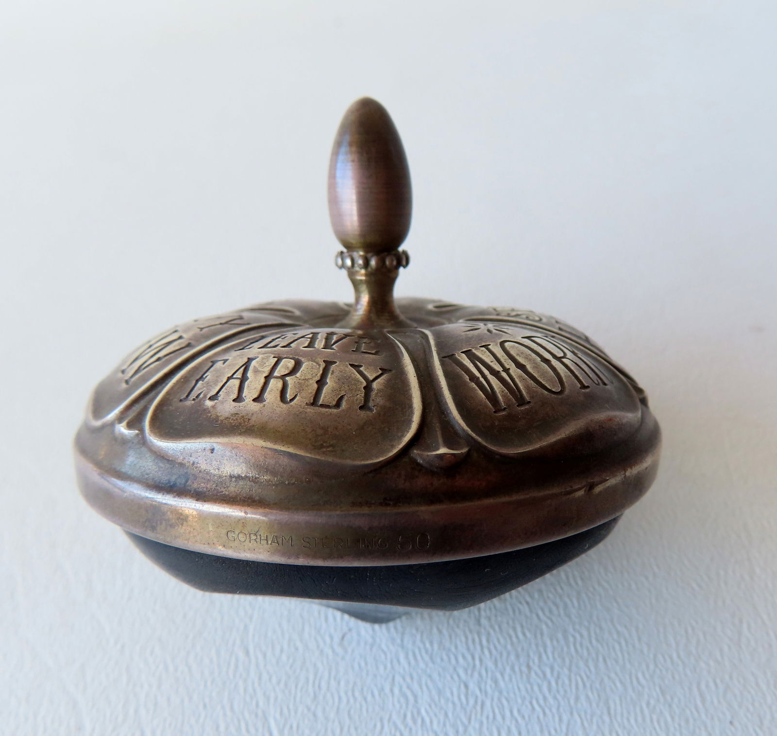 A Gorham sterling silver executive's spinning top 6 options including "Buy Low", "Sell High", etc. (1 of 4)