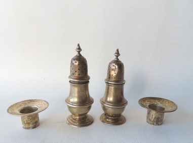 A pair of hallmarked sterling silver salt and paper shakers and 2 hallmarked sterling silver