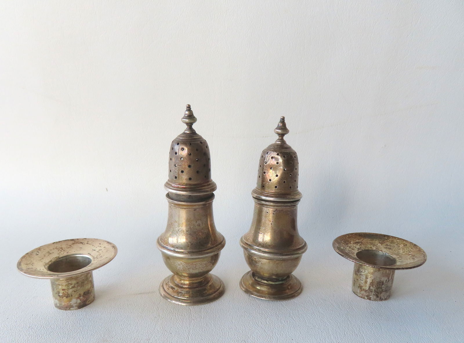 A pair of hallmarked sterling silver salt and paper shakers and 2 hallmarked sterling silver (1 of 3)