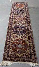 Oriental woven runner, early 20th century. Some losses to fringe on ends, else good condition.