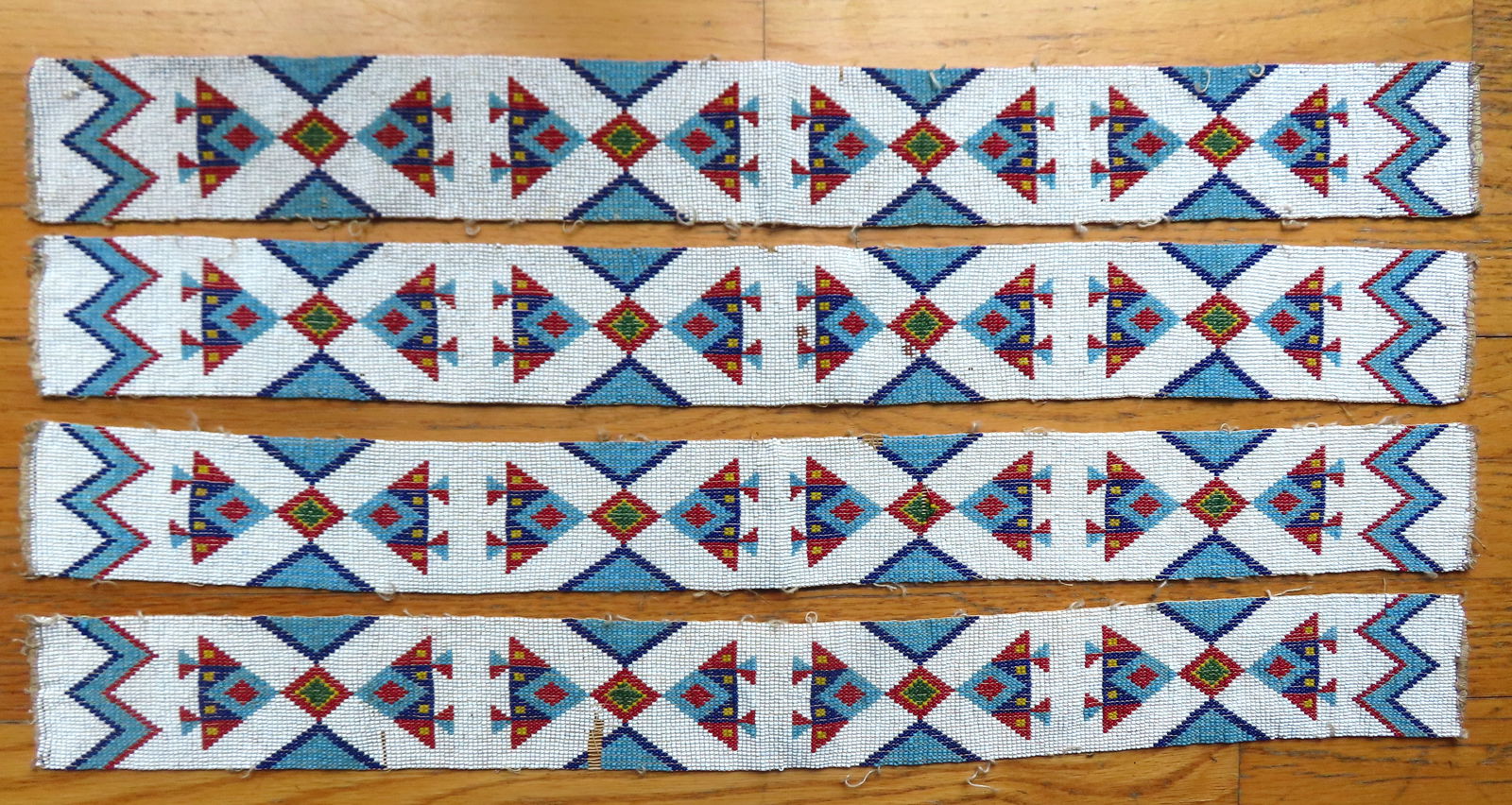 Four beaded Native American panels, each approximately 26"L x 2 3/4"W. All in good condition, (1 of 4)