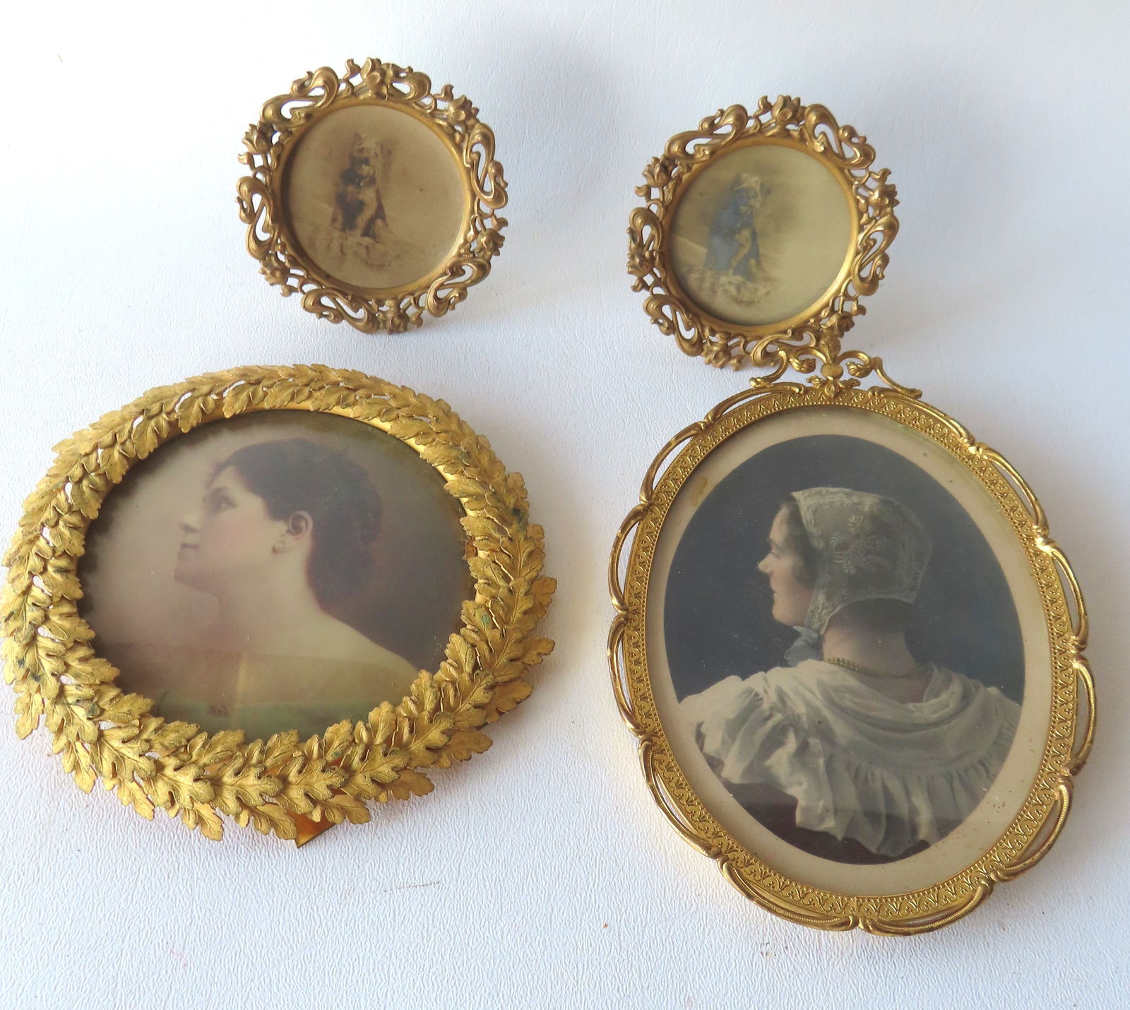 Grouping of 4 fancy gilded metal frames, all believed to be late 19th to early 20th century and (1 of 8)
