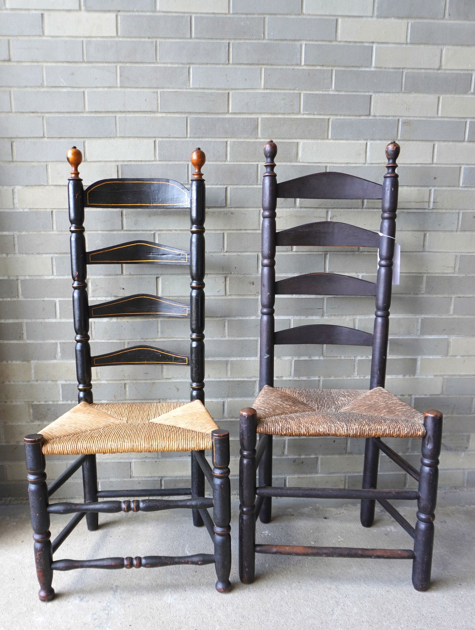 Two ladder back side chairs, near matching, early 19th century. One appears to retain original black (1 of 12)