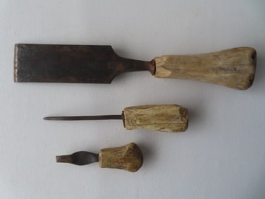 Three primitive iron tools with cow bone handles, 19th century, good condition. The largest, a