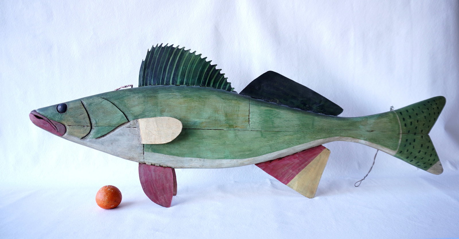 Jeff Raymond, folk-art fish carving (1949-2022, Poughkeepsie and Red Hook NY). A large carved wooden: Jeff Raymond, folk-art fish carving (1949-2022, Poughkeepsie and Red Hook NY). A large carved wooden fish in original paint and having painted tin fins, very good condition. Signed "Raymond 1994". Mea