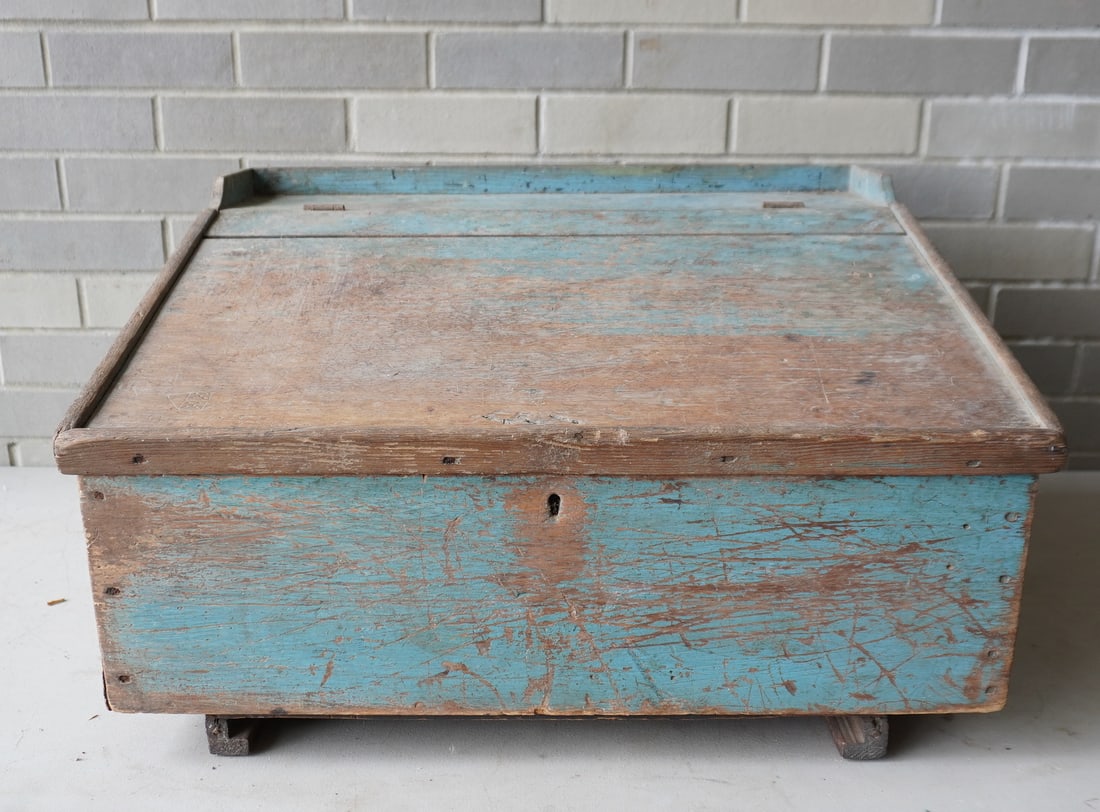 A primitive country store desk in original worn blue paint, early to mid 19th century. Slanted lid, (1 of 6)