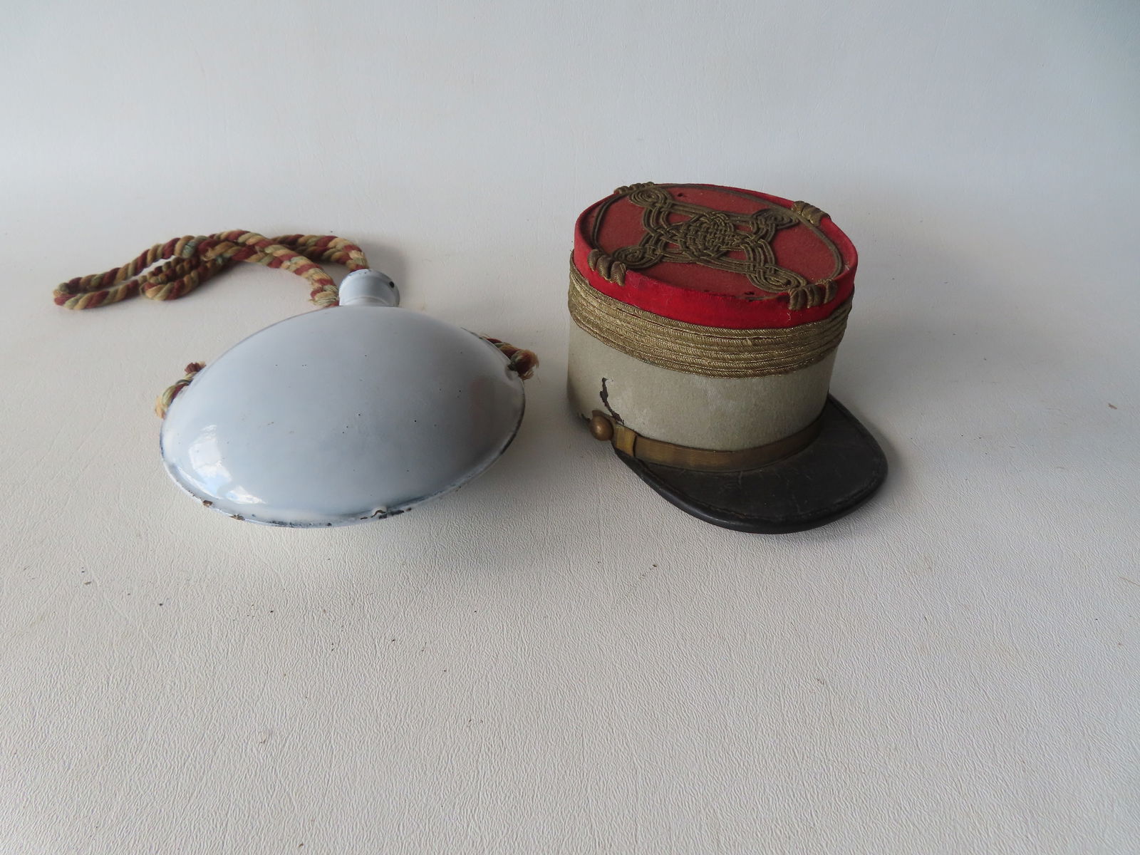 Two small military collectibles: The first a miniature French military kepi, circa 1900, either for (1 of 11)