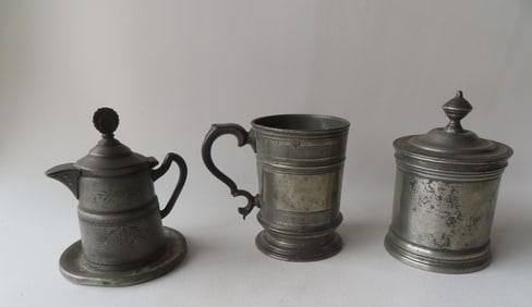 Three pieces of early 19th century metal work, including: Pewter mug with touch marks and script