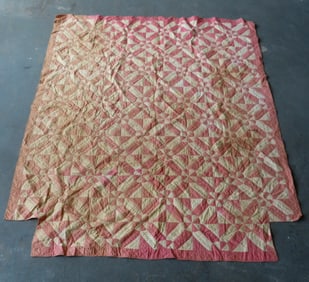 A 4 poster bed patchwork quilt, all hand sewn, 19th century. Some areas are noticeably faded and
