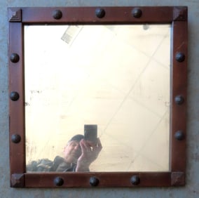 A folk art wall mirror, circa 1920-30, very good condition. Measures 16 1/4" x 16 1/4". Provenance: