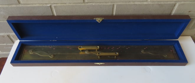 A large contemporary brass parallel rule in original box, marked "Made in Great Britain", circa