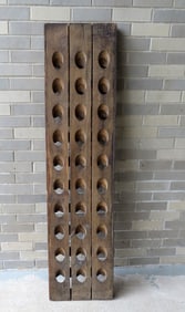 A French wooden wine rack signed "Saint Lebon ….. Pernay France" - expansion cracks between