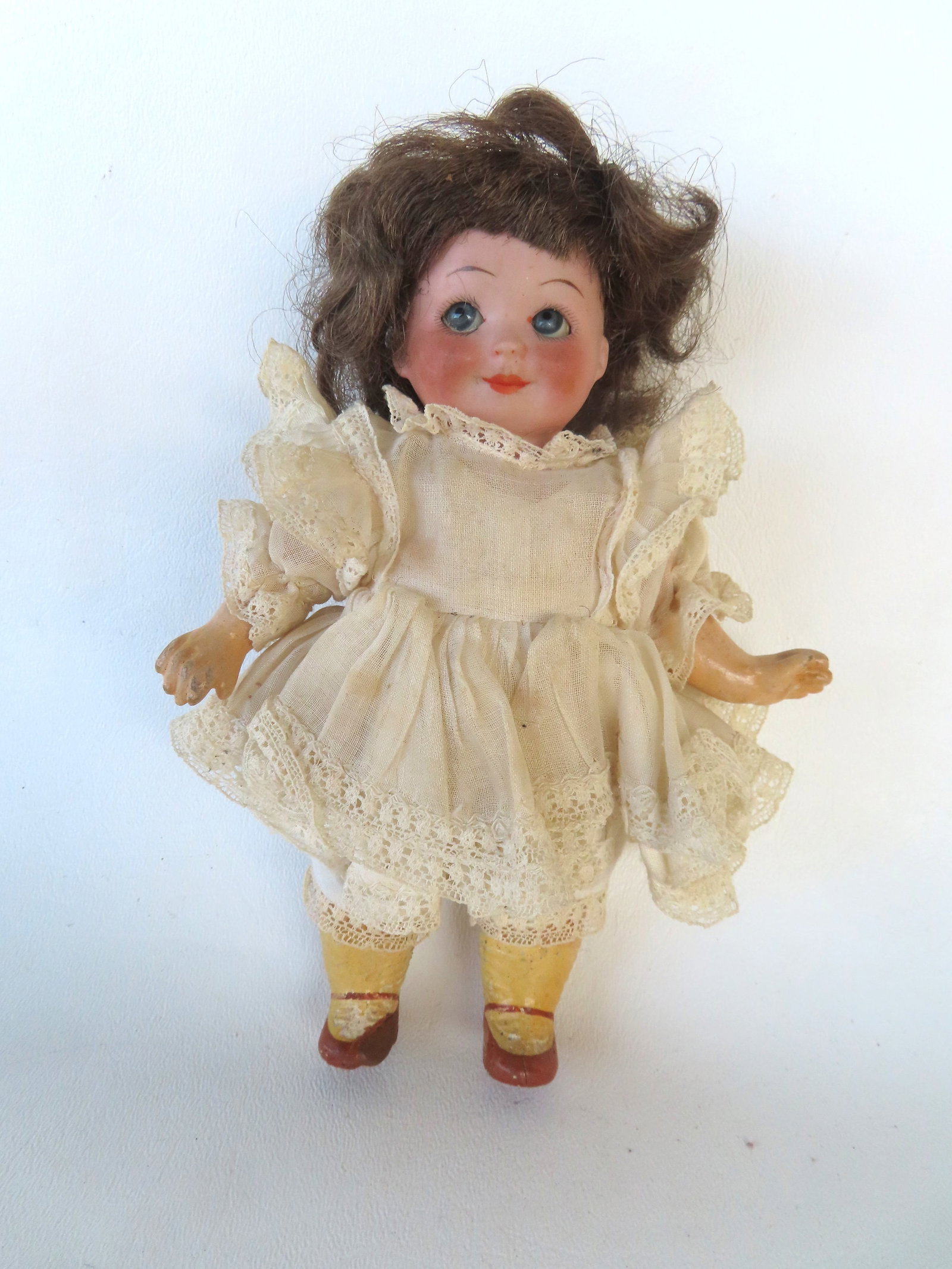 A googly eye German doll signed "Nobbi Kidd / Reg. U.S. Patent / Germany / 11/0" - spider crack on: A googly eye German doll signed "Nobbi Kidd / Reg. U.S. Patent / Germany / 11/0" - good overall condition but please review photos for your own assessment of quality. Measures 7"L. Provenance: From th
