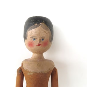A good folk art articulated stick doll with peg joints, all hand carved in original paint, very good