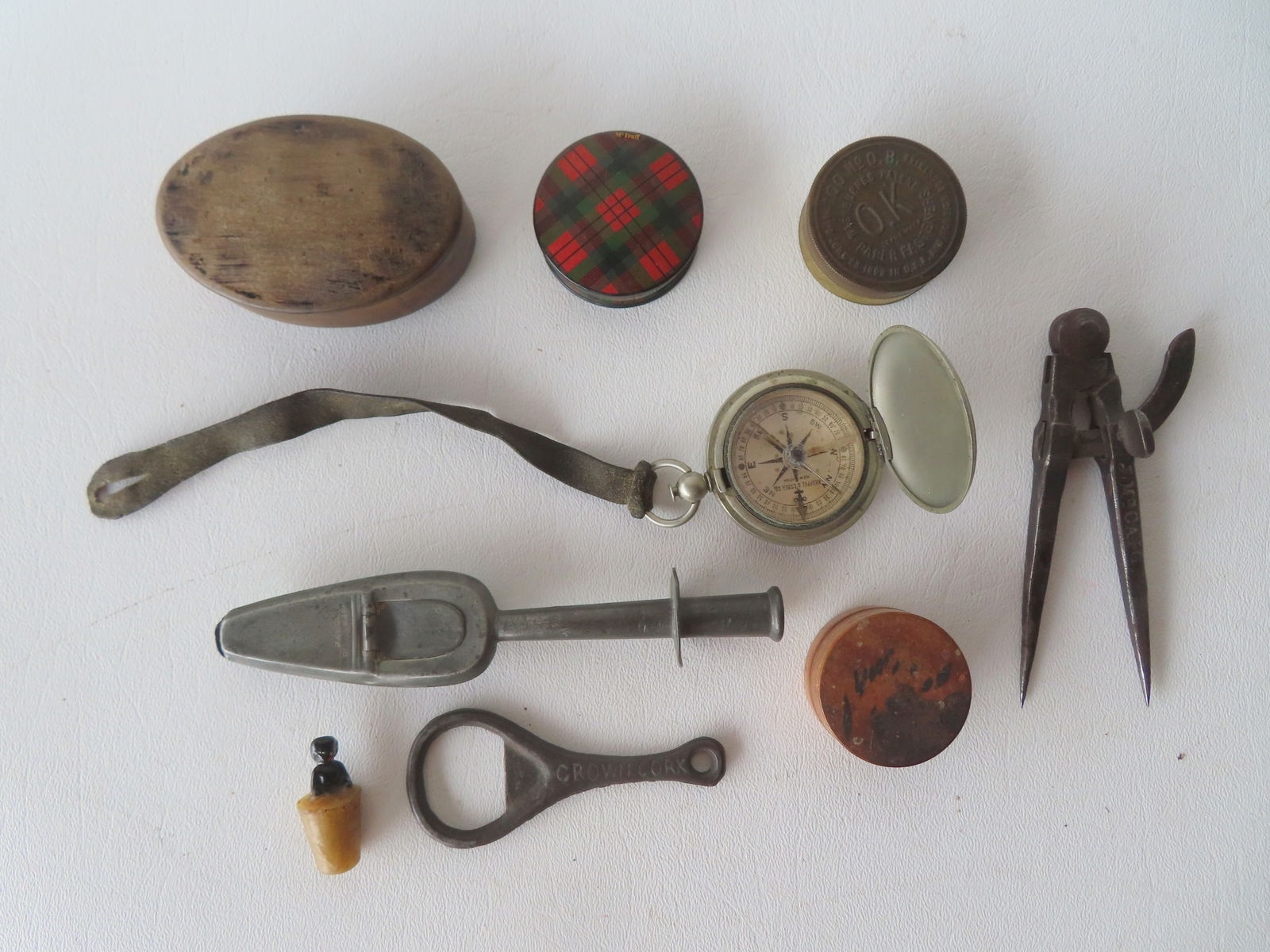 A grouping of country miniatures, all 19th to early 20th century, including: A paper mache snuff box (1 of 9)