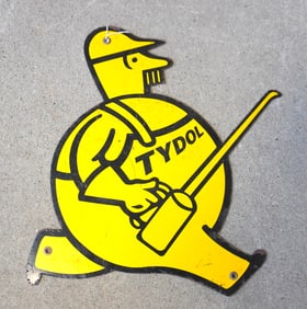 An enameled advertising sign for Tydol - man with oil can. Some paint blisters, otherwise good