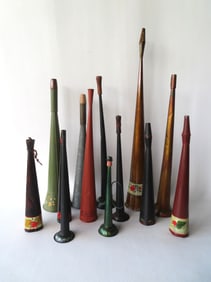 Grouping of 13 toleware horns, 19th century, most in late 20th century paint. Ranging in size from 9