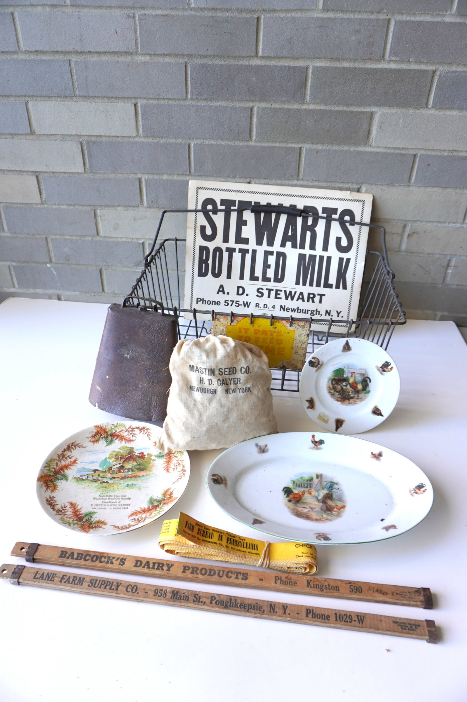 Grouping of mostly farm related collectibles, most circa 1950. Includes a vintage cardboard: Grouping of mostly farm related collectibles, most circa 1950. Includes a vintage cardboard advertising sign for Stewarts Bottled Milk - this is the largest measuring 11" x 14" - Newburgh NY, poultry