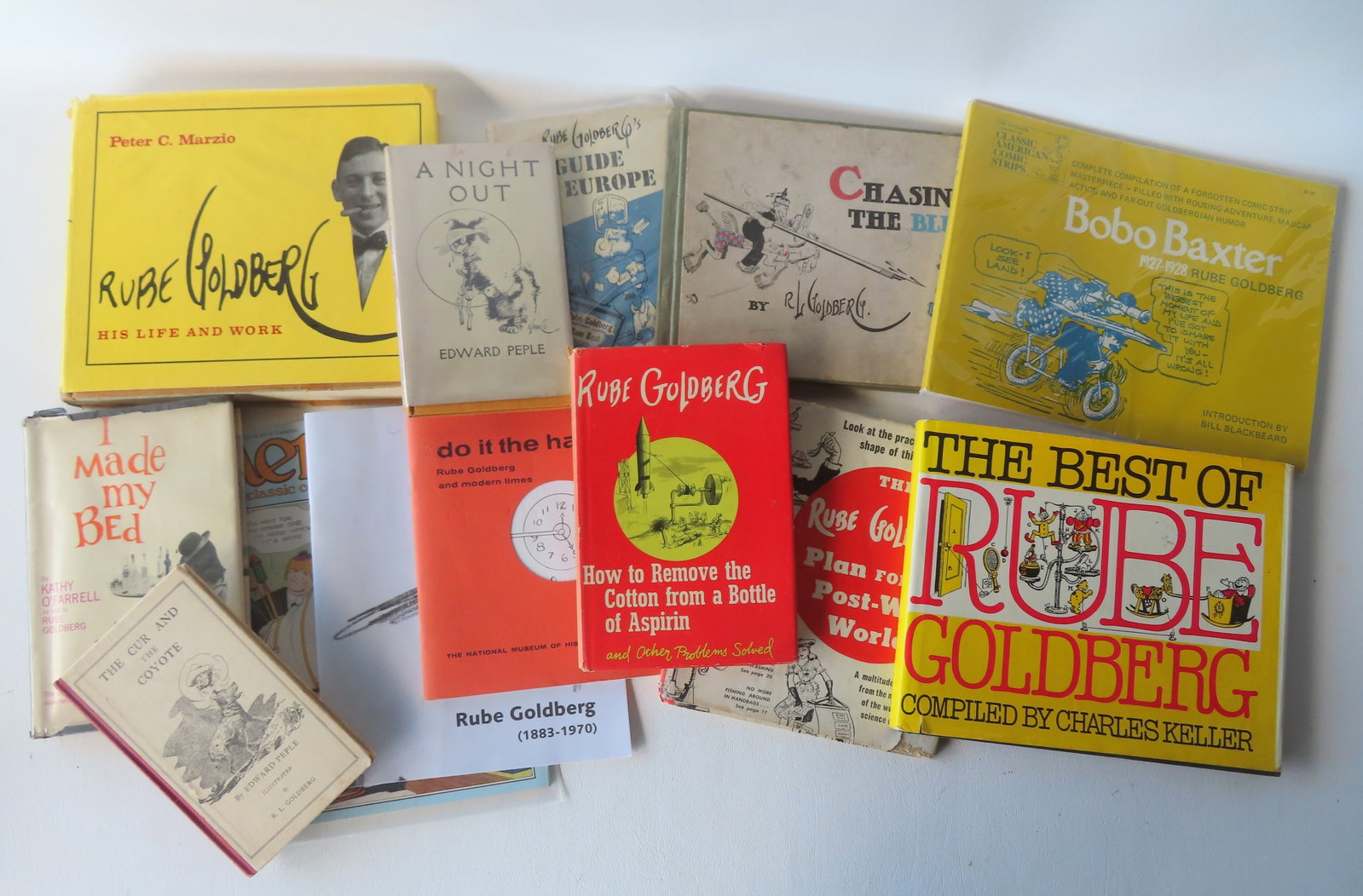 Grouping of Rube Goldberg's related books, most in very good condition. Provenance: From a private: Grouping of Rube Goldberg's related books, most in very good condition. Provenance: From a private physician's collection, Hartford, CT.