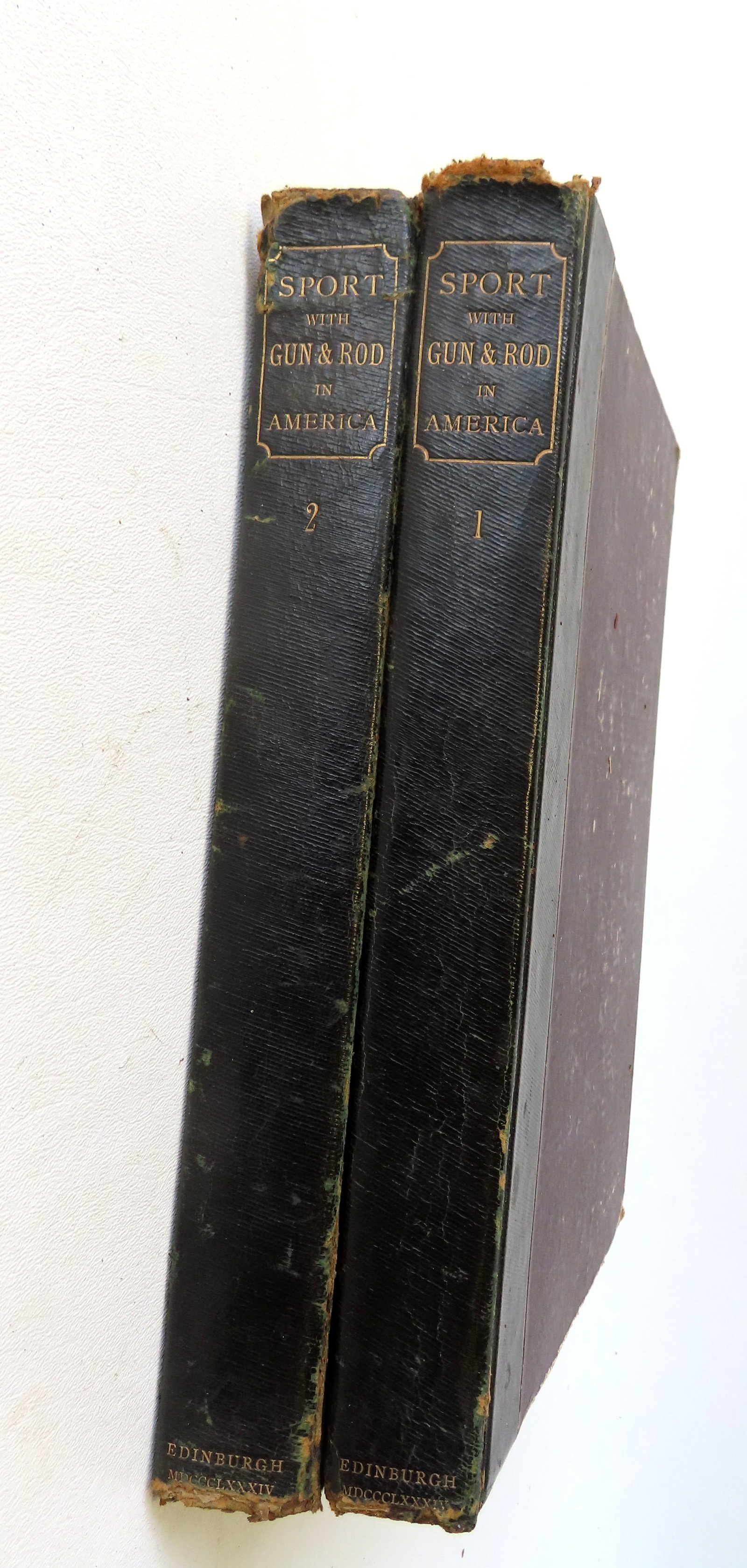 Book titled "Sport With Gun And Rod in American Woods And Waters" edited by Alfred M. Mayer,: Book titled "Sport With Gun And Rod in American Woods And Waters" edited by Alfred M. Mayer, published in Edinburgh in 1884. Complete with full page animal illustrations. Measures 8" x 11 1/4". Wear t