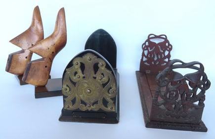 Grouping of bookends: 1) Adjustable in rosewood with brass embellishments, early 20th century - very