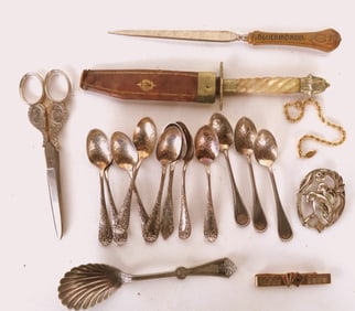 Grouping of decorative accessories including a double edge dagger, royalty scissors, etc.