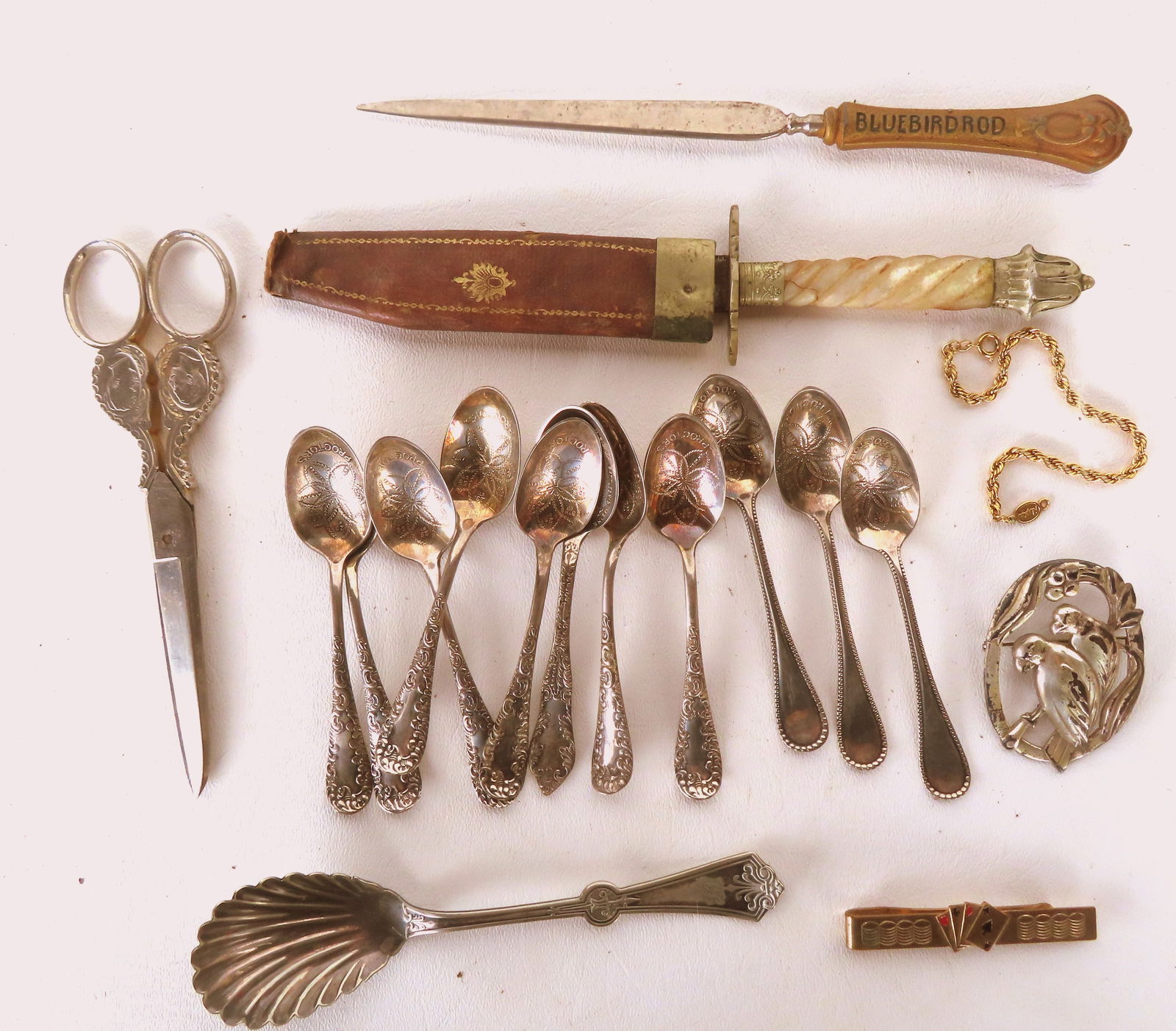 Grouping of decorative accessories including a double edge dagger, royalty scissors, etc. (1 of 19)