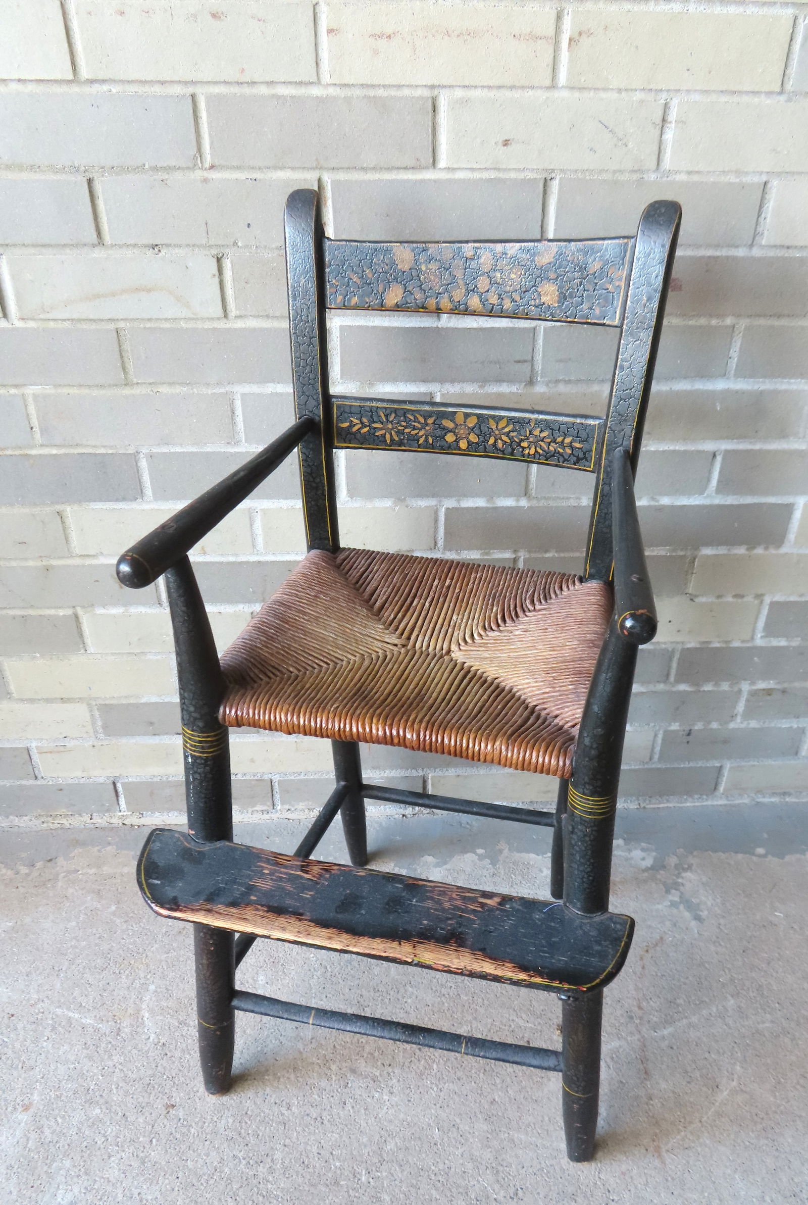 An early child's rabbit ear high chair with rush seat, and stenciled back splats, circa 1820. The pa (1 of 5)