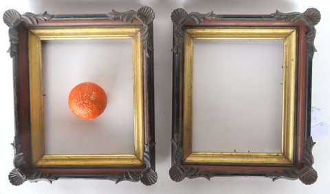 Two very fine Victorian black walnut frames with gold insets and applied painted composition ornamen