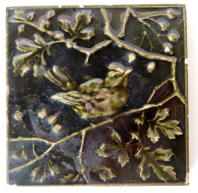 Mintons tile with embossed image of a bird on branch with leaves and berries, late 19th century. Sev