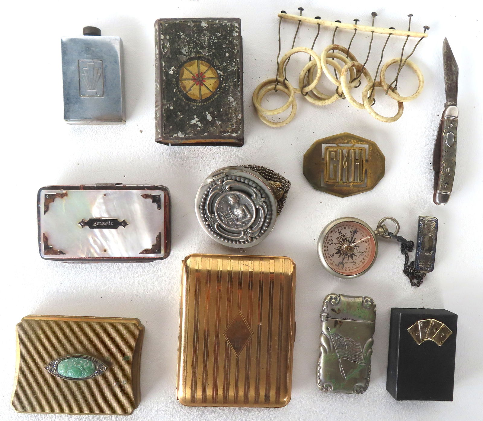 Grouping of vintage decorative accessories including a German silver match safe decorated with an Am (1 of 15)