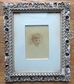 W/C Portrait of a small child housed in it's original painted gesso frame and original backing, prob