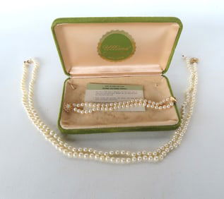 Two pair of cultured pearls in on original box marked "Ultima Cultured Pearls 14K Gold" - both with