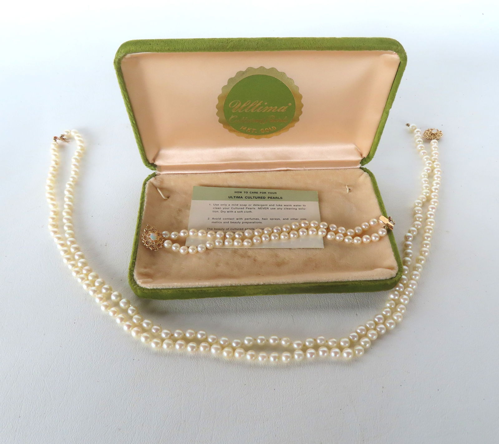 Two pair of cultured pearls in on original box marked "Ultima Cultured Pearls 14K Gold" - both with (1 of 13)