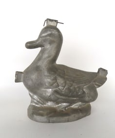 A figural duck chocolate mold, either zinc or heavy cast aluminum, early to mid 20th century. Missin