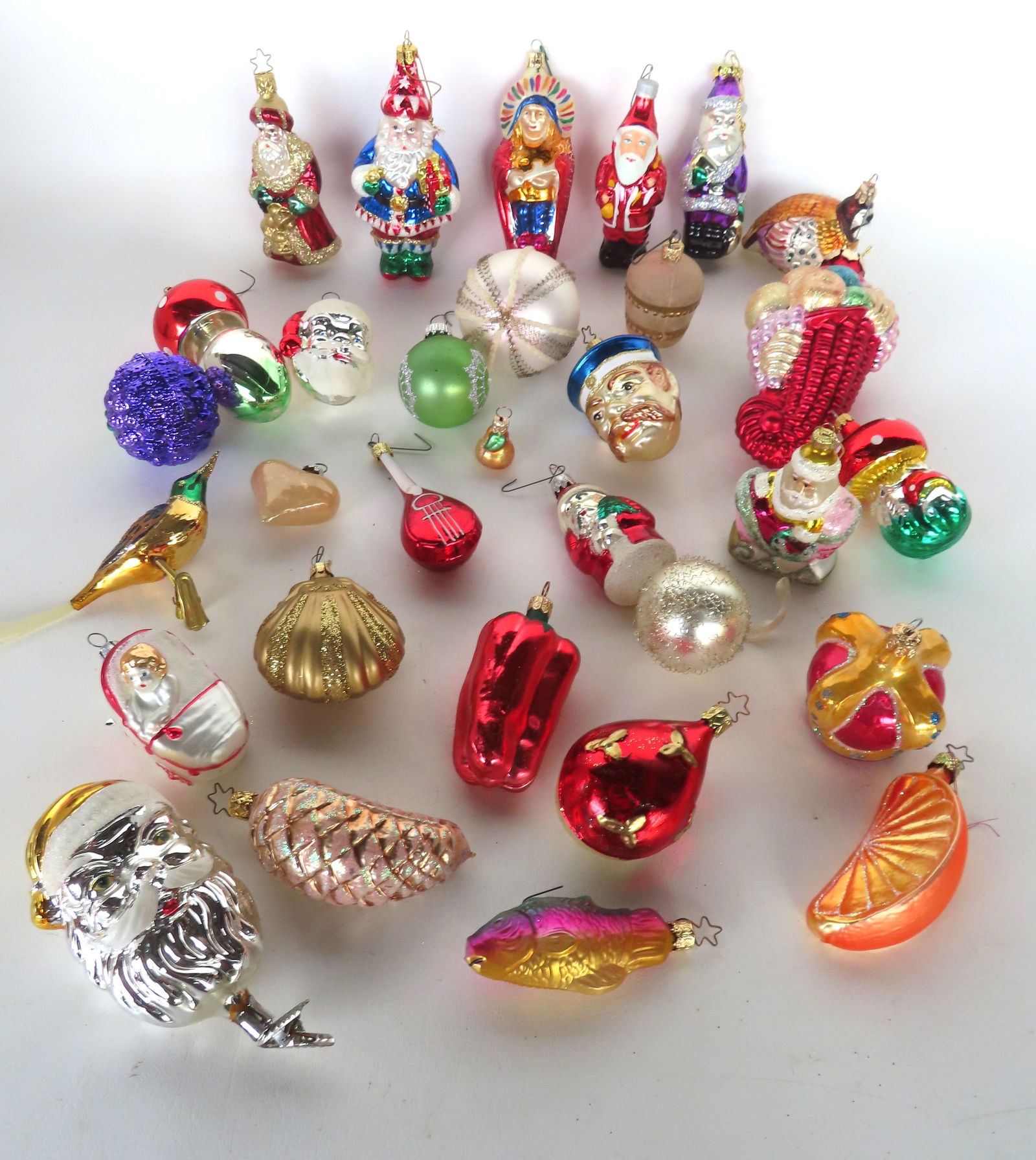 Grouping of 30 mostly semi-modern Christmas figural glass ornaments including Santa's, horn of plent (1 of 15)